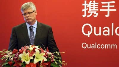 China hits Qualcomm with record $975m antitrust fine