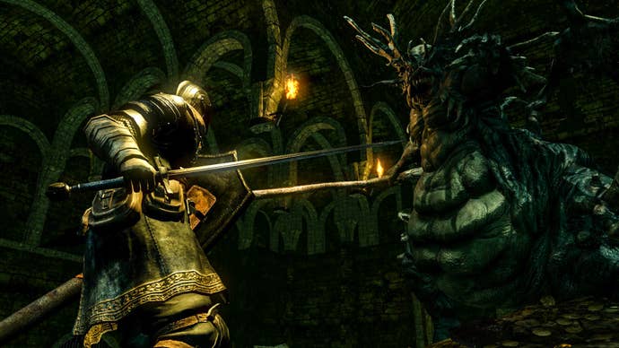 The player fights the Asylum Demon in Dark Souls Remastered