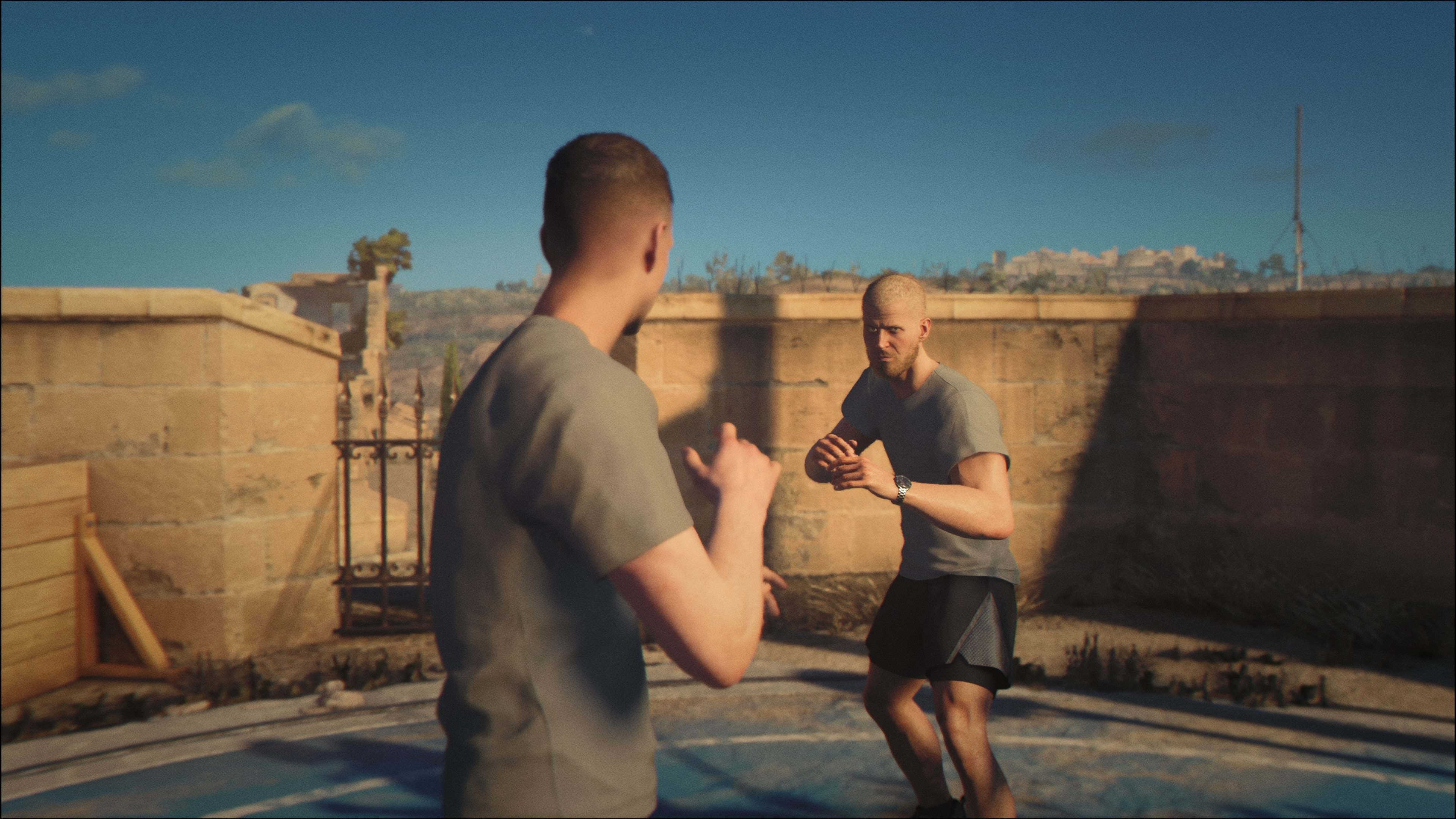 A screenshot of 007 First Light, showing bond sparring with Monroe during 00 training.