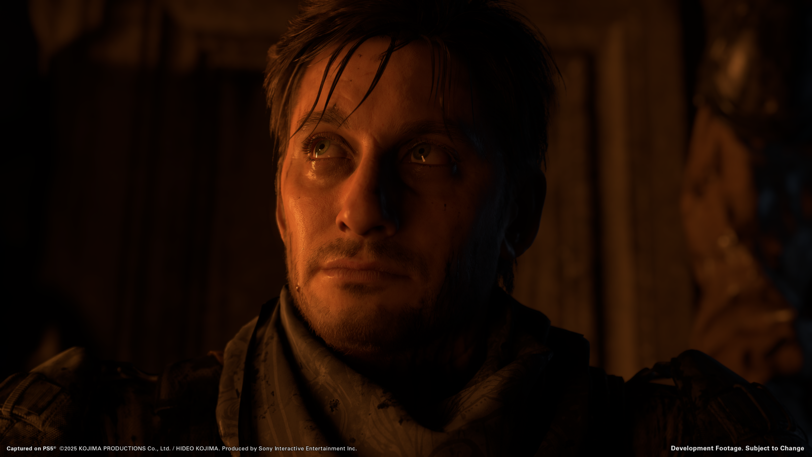 Death Stranding 2 screenshot showing Luca Marinelli's character in close up dimly lit