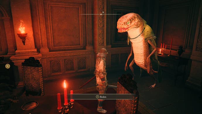 A warrior speaks with a giant snake in a mansion lounge in Elden Ring