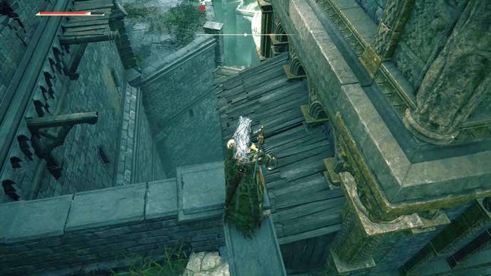 A knight stands on the rooftop of Stormveil Castle looking down in Elden Ring