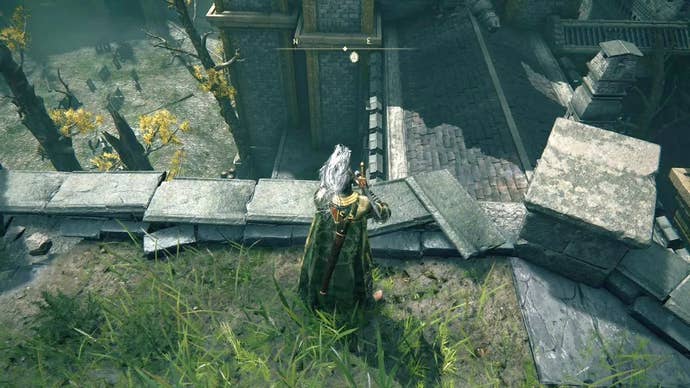 A knight stands on top of a grassy roof in Stormveil Castle in Elden Ring.