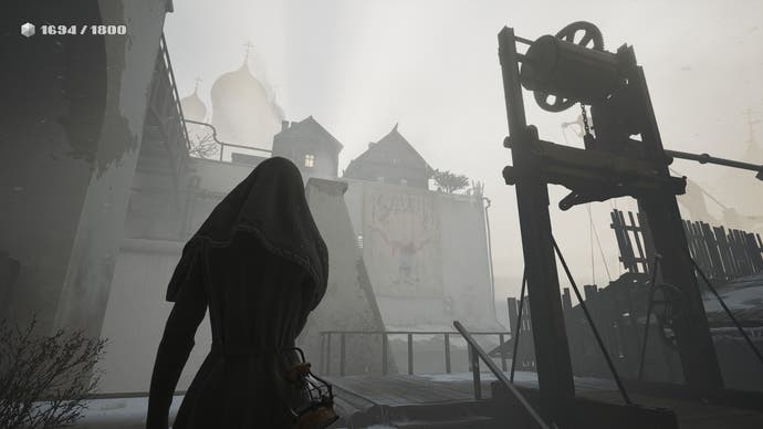 Indika screenshot showing Indika walking through a grim courtyard