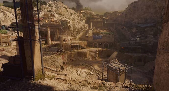 A screenshot of Call of Duty: Black Ops 6’s The Tomb map for Zombies mode, showing an abandoned excavation site leading to ancient catacombs.