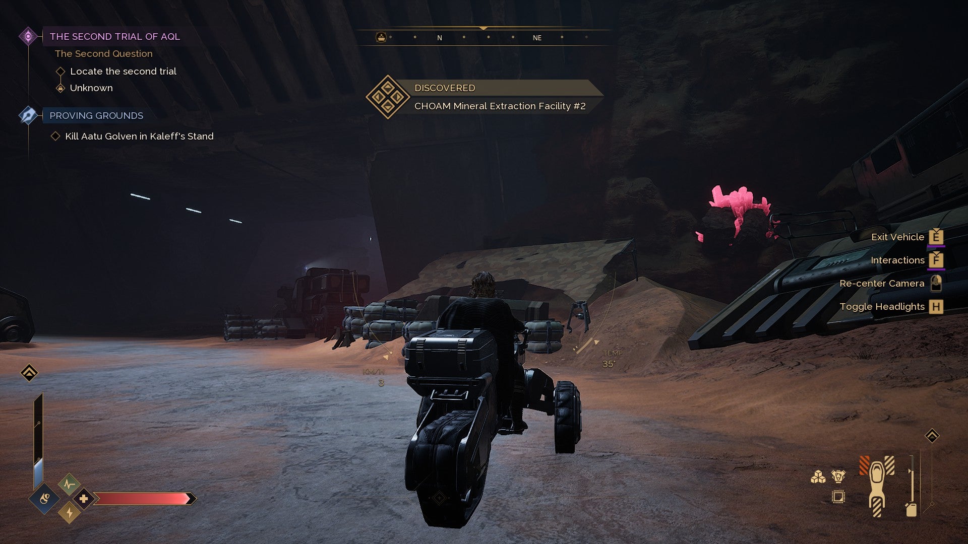 A character on a Sandbike parks at the CHOAM Mineral Facility in the Hagga Rift, a mining area in Dune Awakening. - 4