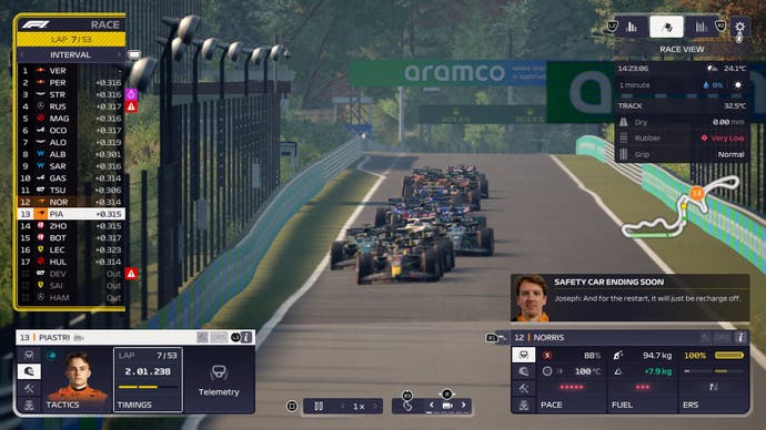 F1 Manager 2023 review screenshot, cars bunched together in a line as safety car ends.