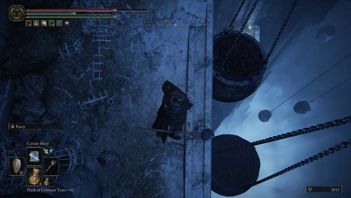 A Tarnished looks down at a cliff overlooking two hanging jars in Elden Ring: Shadow of the Erdtree.