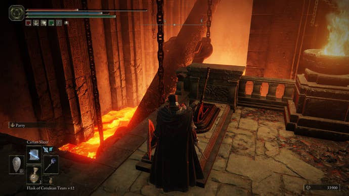 Standing by a lever overlooking a magma lake and a pipe in Elden Ring: Shadow of the Erdtree.