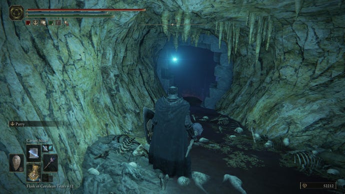A Tarnished looks at a passageway leading out of a sewer cave corridor in Elden Ring: Shadow of the Erdtree.