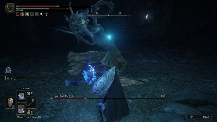 Fighting the boss Curseblade Labirith in Bonny Gaol in Elden Ring: Shadow of the Erdtree.