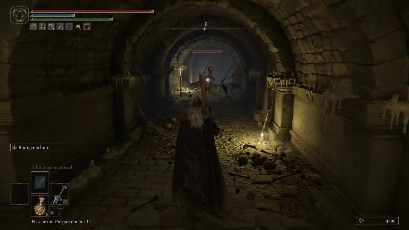 A warrior faces two skeletons in a narrow passageway in Auriza Hero&rsquo;s Grave in Elden Ring.