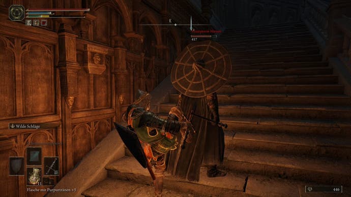 A warrior kicks an enemy in the back in the Carian Study Hall in Elden Ring