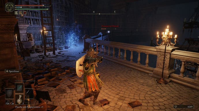 A warrior shoots at a far off enemy inside the Carian Study Hall in Elden Ring