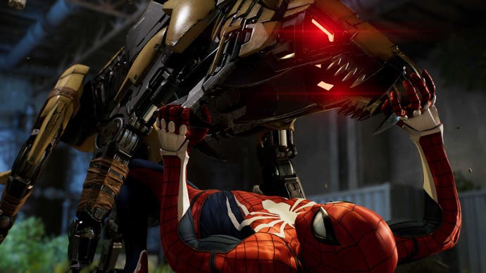Peter Parker as Spider-Man fights off one of Kraven's mechanical dog enemies in Marvel's Spider-Man 2