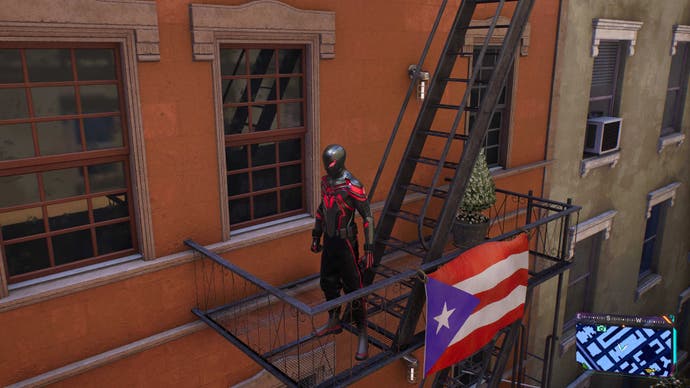 Miles Morales as Spider-Man outside his Harlem home with a Puerto Rican flag on the fire escape.