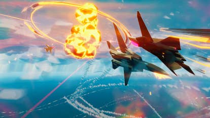 Two cell-shaded pitchy planes streaking past each different with an detonation successful the background, from Delivery Must Complete. There are besides rocket trails and clouds successful the distance.