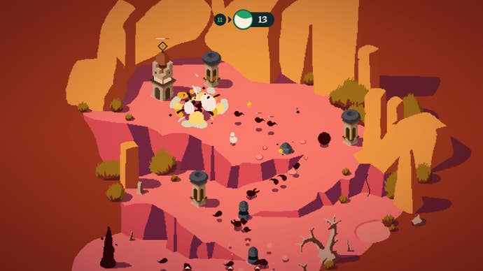 A bunch of inkblot monsters attacking towers on a red canyon map in Rift Riff