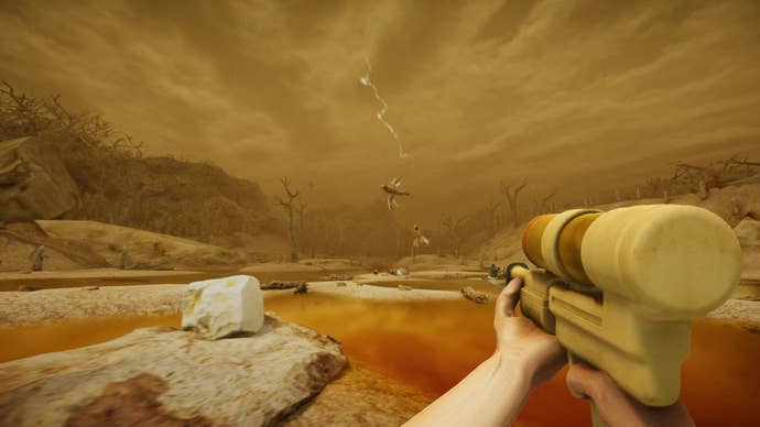 A first-person view of a yellow orange wasteland with the player character holding a yellow water gun of some kind, in Urge