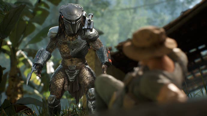 The Predator standing over a fallen human in Predator: Hunting Grounds