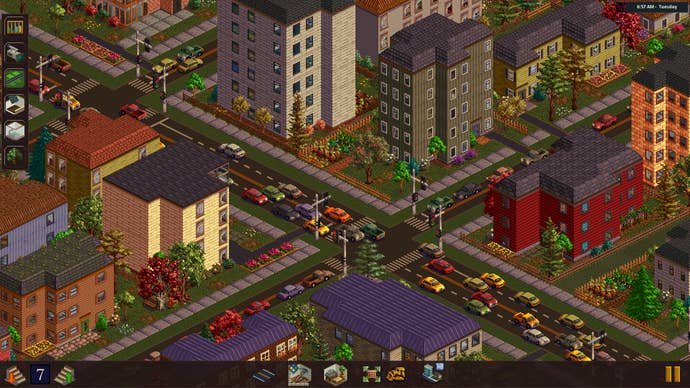A city junction with high rises in throwback management game Metropolis 1998
