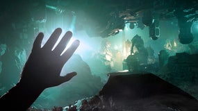 A view of a sunken cavern city with green stone buildings on the ceiling, with the player's hand blotting out a distant light source. From Cthulhu: The Cosmic Abyss.