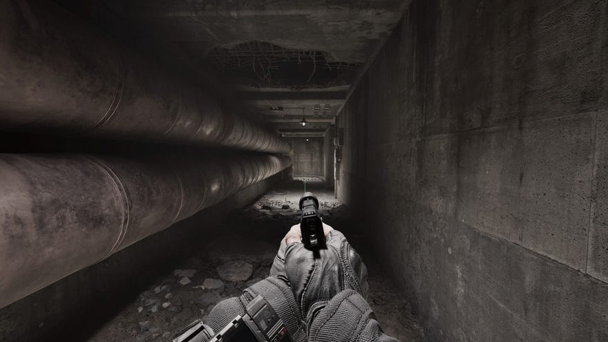 Somebody aiming a pistol in first-person down a long, pipe-lined tunnel in Beautiful Light