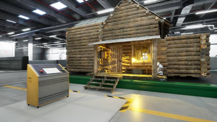 A log cabin on a factory floor with a button panel outside in The Cabin Factory