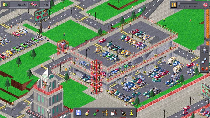 A clump of roads and carparks surrounded by greenish lawns and a fewer conifer trees successful Car Park Capital