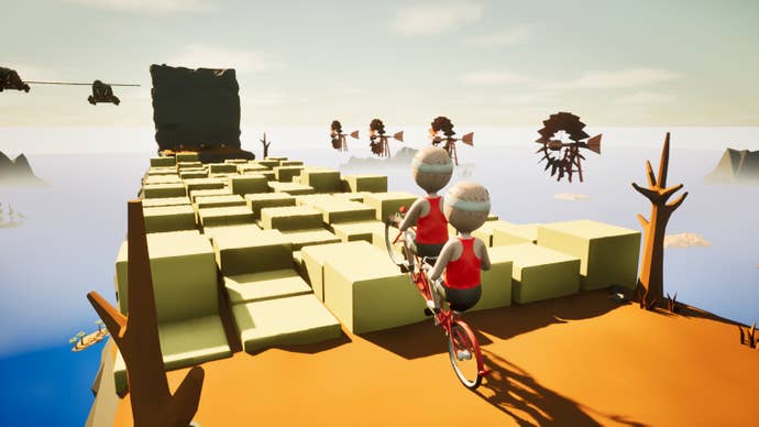 Two bobblehead bicyclists on a tandem trying to cycle across a floating platform of ramps and blocks.