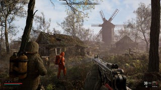 A ruined village with a windmill in STALKER 2 and two characters advancing through the rubble