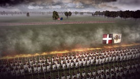 A close-up view of massed gunpowder infantry opening fire at distant enemies across green fields in Master Of Command