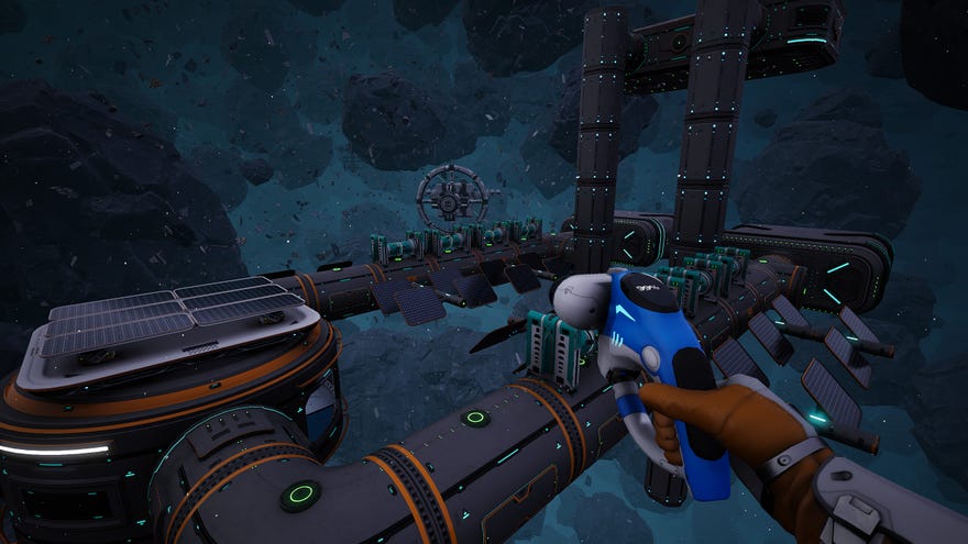 A first-person view of an astronaut flying over a big modular space station in Astrometica