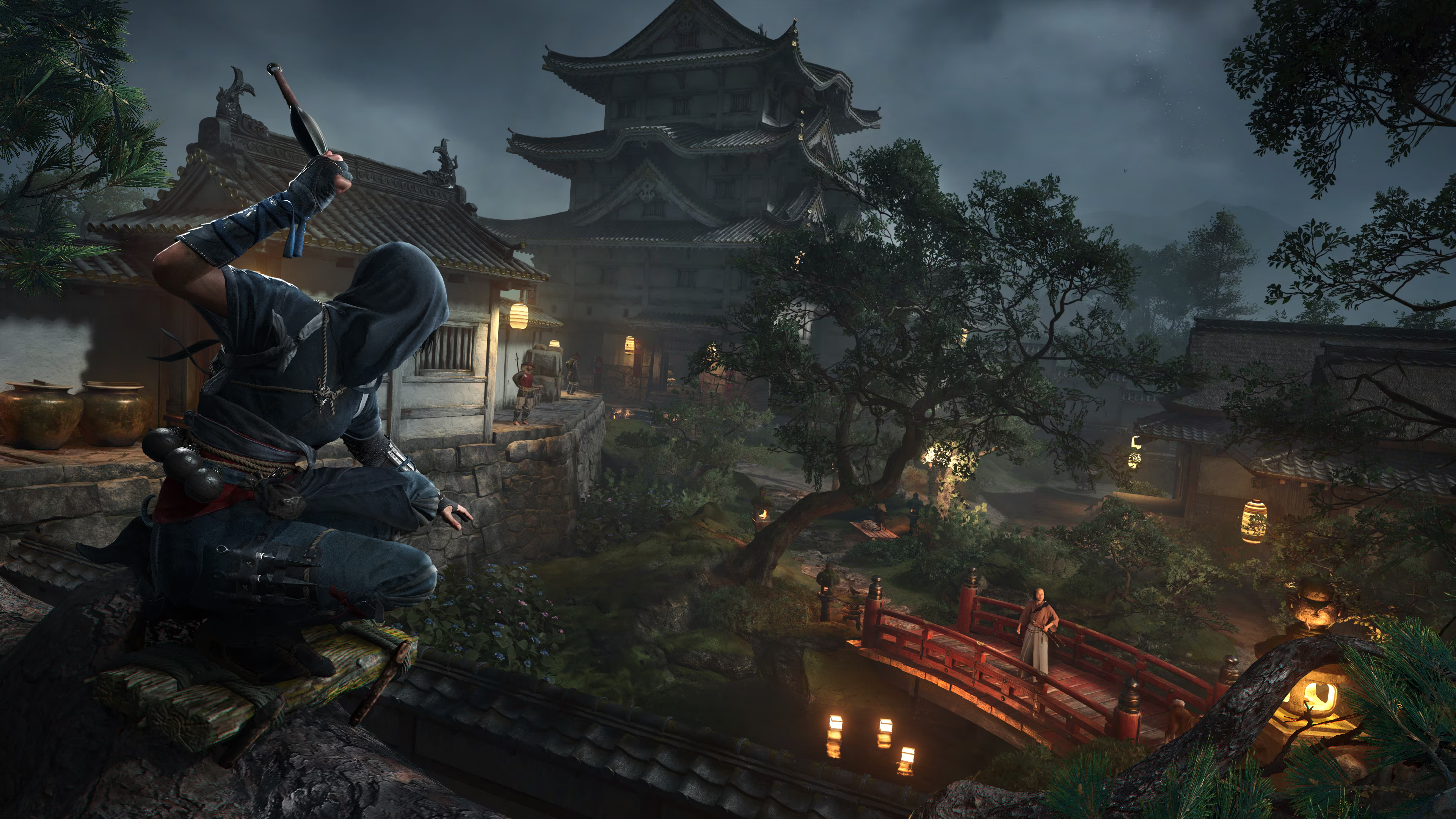Young shinobi Naoe making her way through a castle at night in Assassin&rsquo;s Creed Shadows