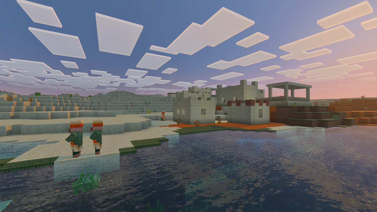 A cloudy sunset by the waterside in Minecraft, featuring new reflection and lighting effects added with the Vibrant Visuals update
