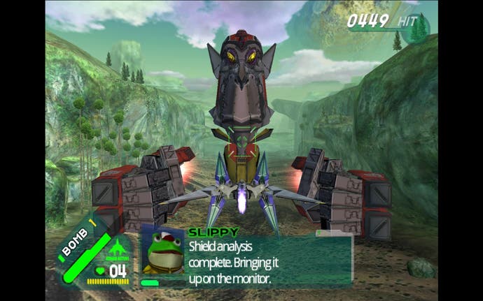 Star Fox Assault screenshot, Arwing approaching a giant floating metal head with two detached hands in a rainforest.