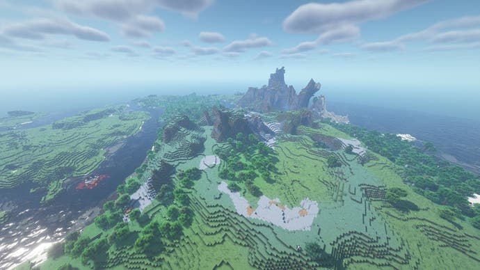 Eine riesige Minecraft-Landschaft mit Wäldern, Hügeln und felsigen Ebenen und einer Küstengebirgskette in der Ferne.