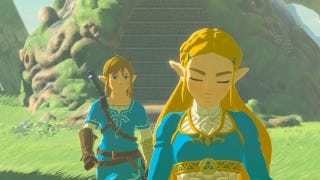 Screenshot of Zelda Breath of the Wild showing Link and Zelda in blue outfits outside a shrine entrance