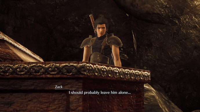 Zack looks down into a coffin in Crisis Core - Final Fantasy VII - Reunion, deciding to leave what’s in there well alone.