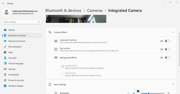 AMD Ryzen AI upgrade to windows camera settings showing automatic framing, eye contact and background effects options
