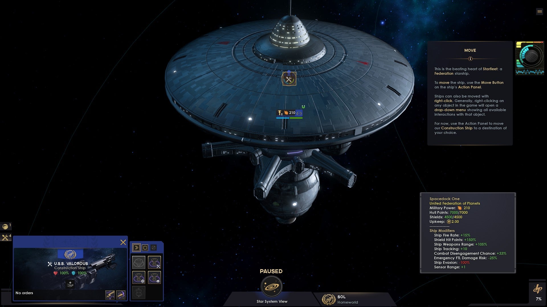 Star Trek: Infinite screenshot showing the Starfleet starbase Spacedock One during the game tutorial
