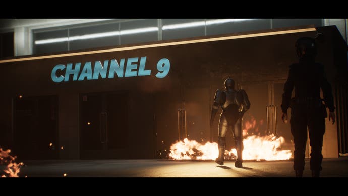 RoboCop: Rogue City screenshot showing RoboCop waddle through flames into the Channel 9 building that's under siege