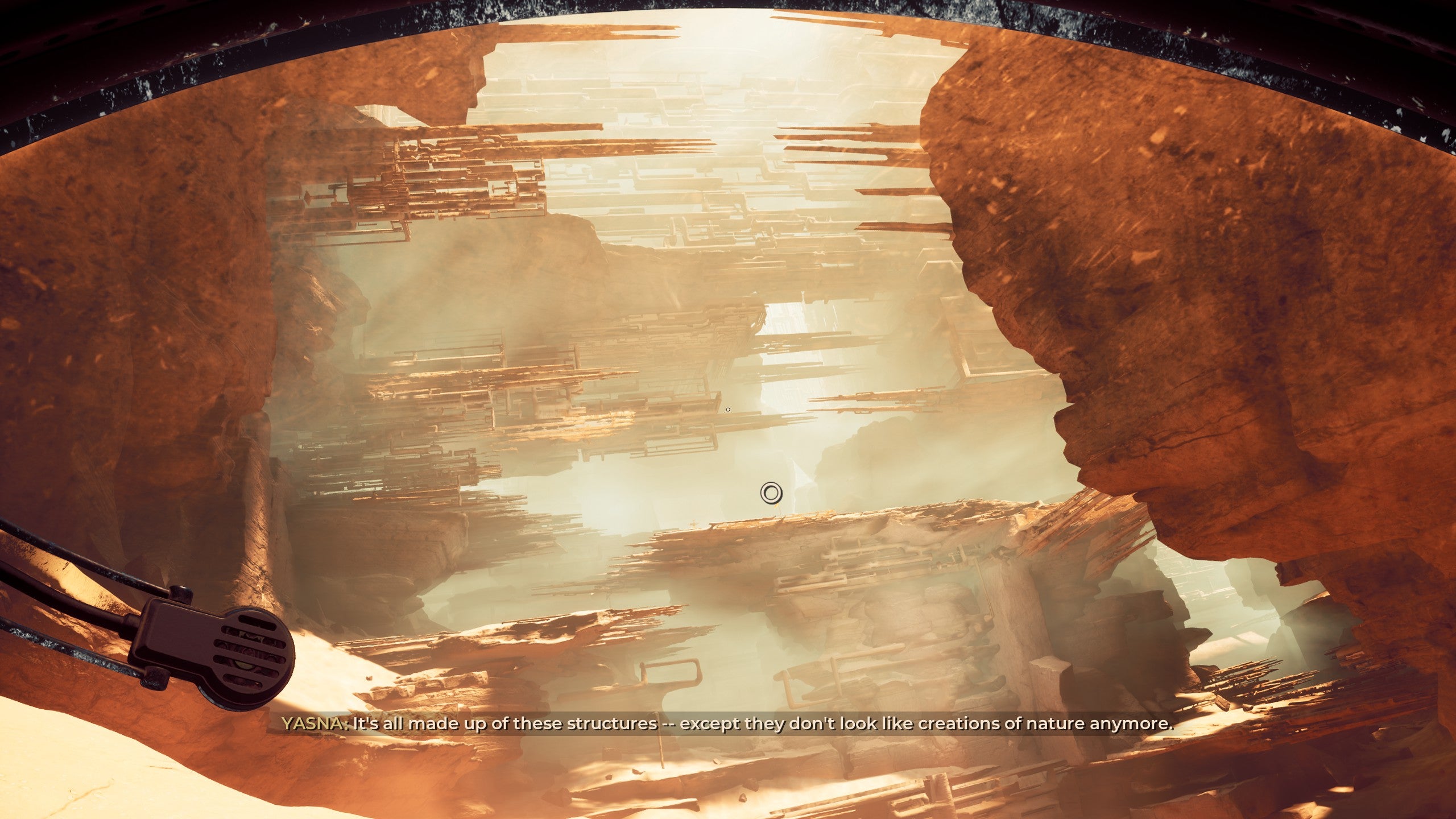 Strange jutting clusters sprout from the sides of a cliff in a dense, dusty canyon. A screenshot from The Incinvible.
