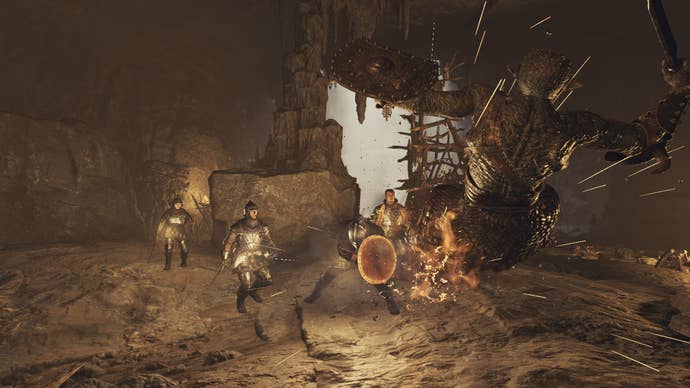 Bashing a goblin with a fiery shield in Dragon’s Dogma 2.