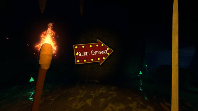 A large, brightly lit sign in a dungeon that reads ‘Secret Entrance’