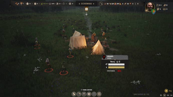 A group of bandits hanging out in their tents in Manor Lords.