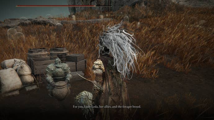 A warrior talks to Moore the Merchant in Shadow of the Erdtree