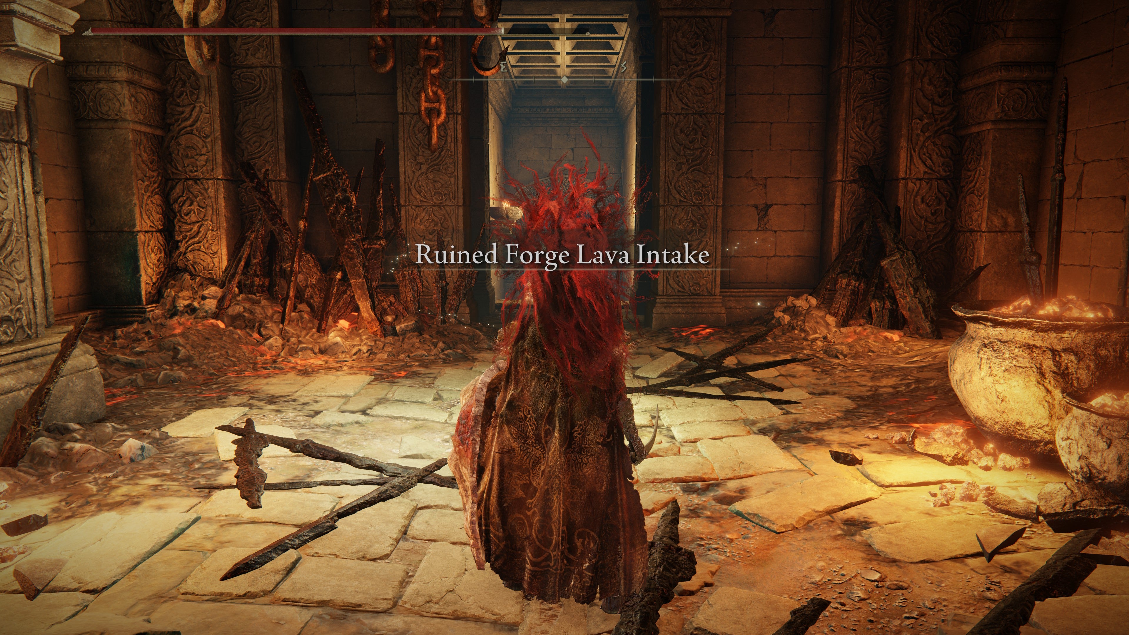 A warrior enters the Ruined Forge Lava Intake dungeon in Shadow of the Erdtree.