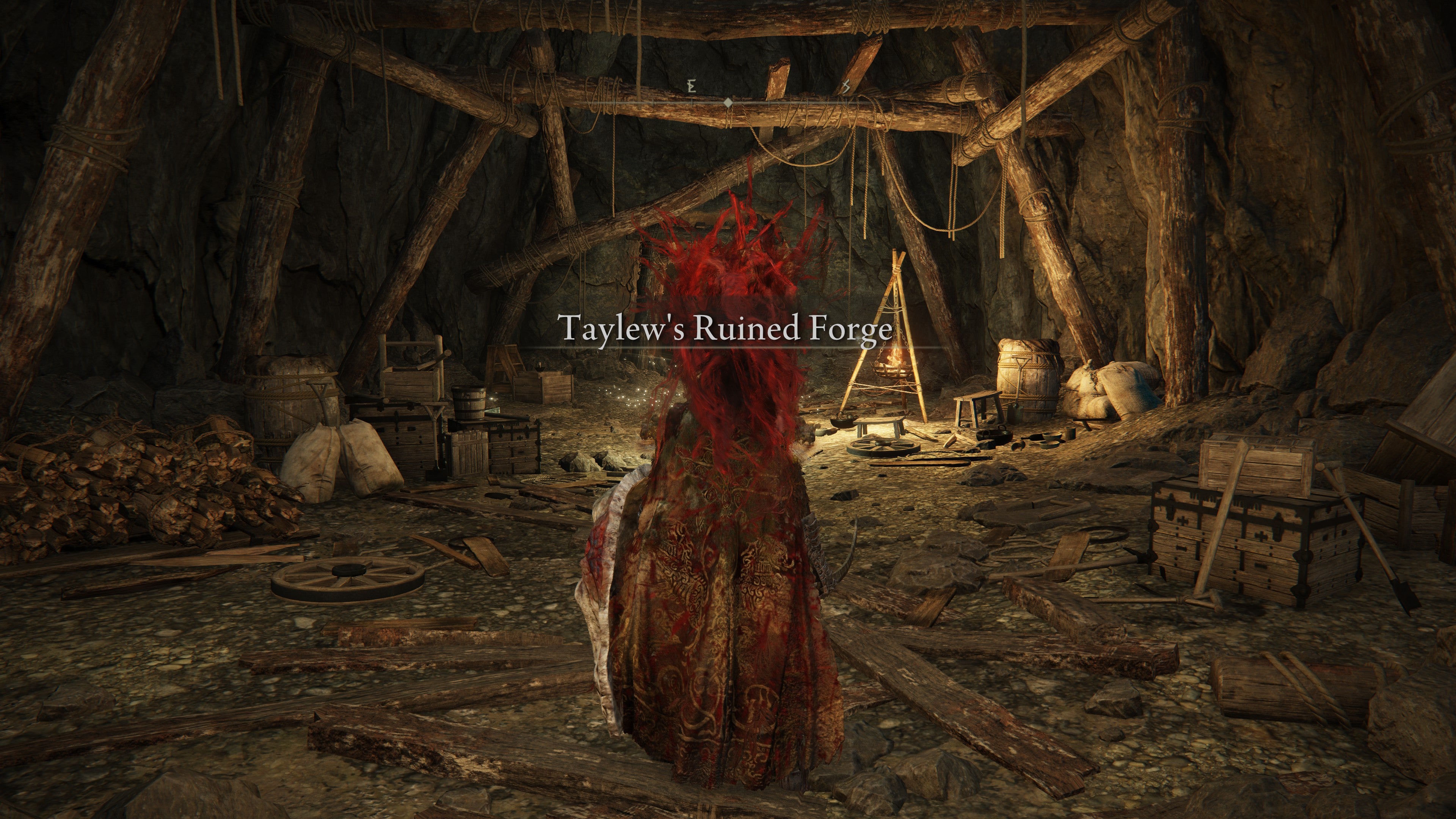 A warrior enters Taylew&rsquo;s Ruined Forge in Shadow of the Erdtree.