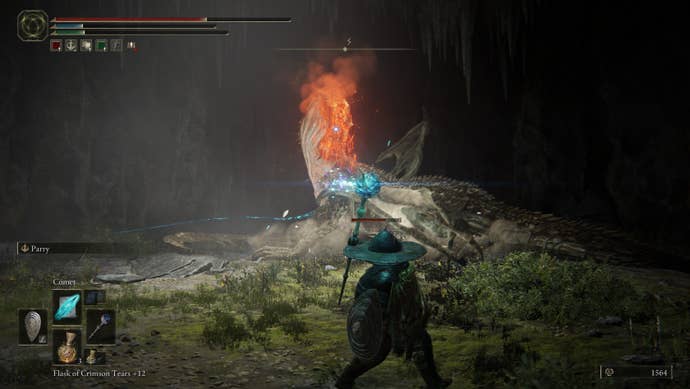 A Tarnished uses magic to fight a dragon in the Dragon’s Pit dungeon of Elden Ring: Shadow of the Erdtree.